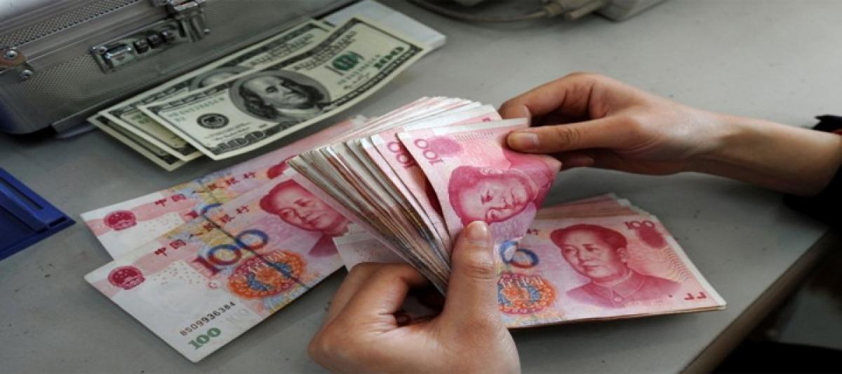 Chinese yuan rises